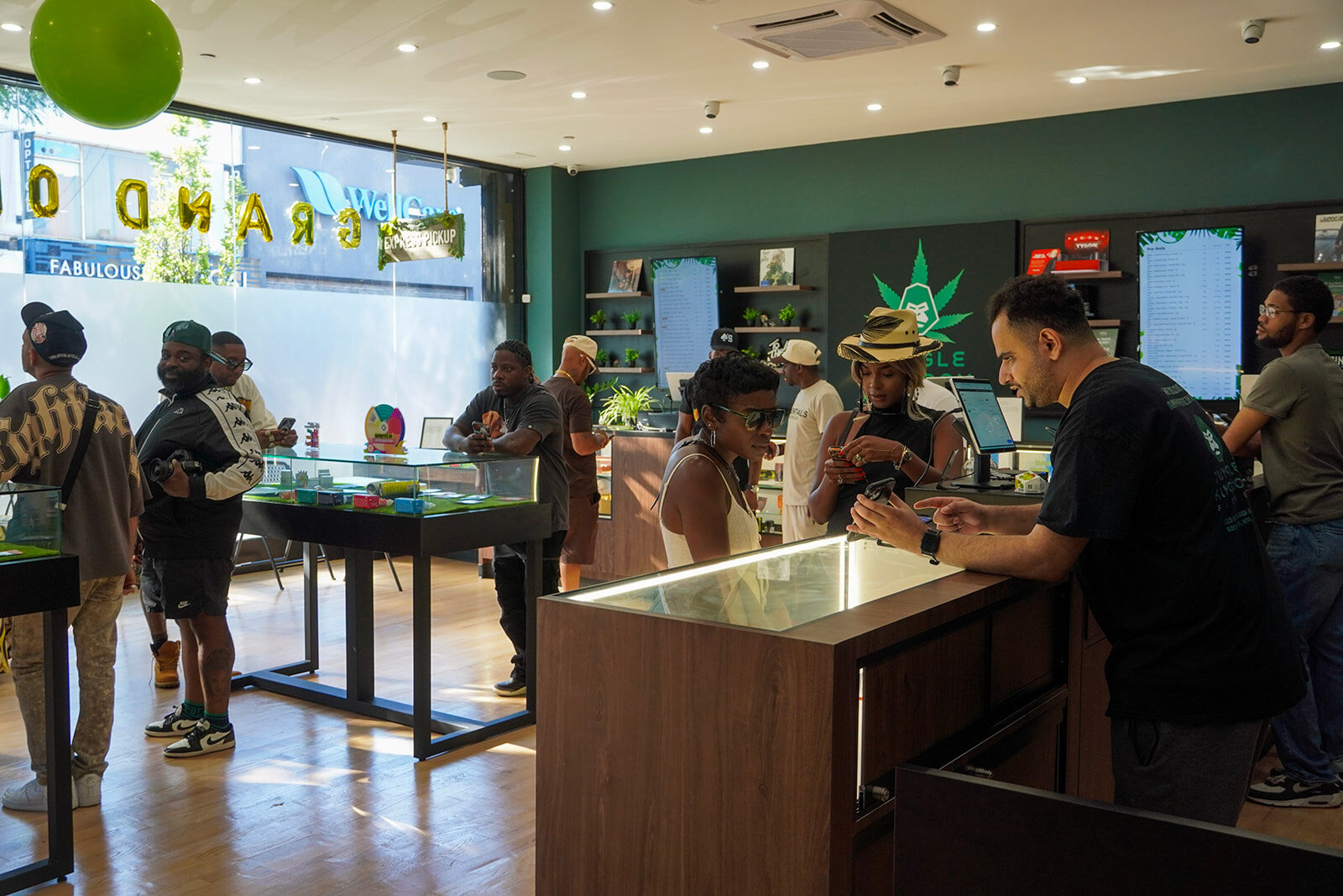 Customers at the counter inside Jungle Kingdom Flower, Brooklyn