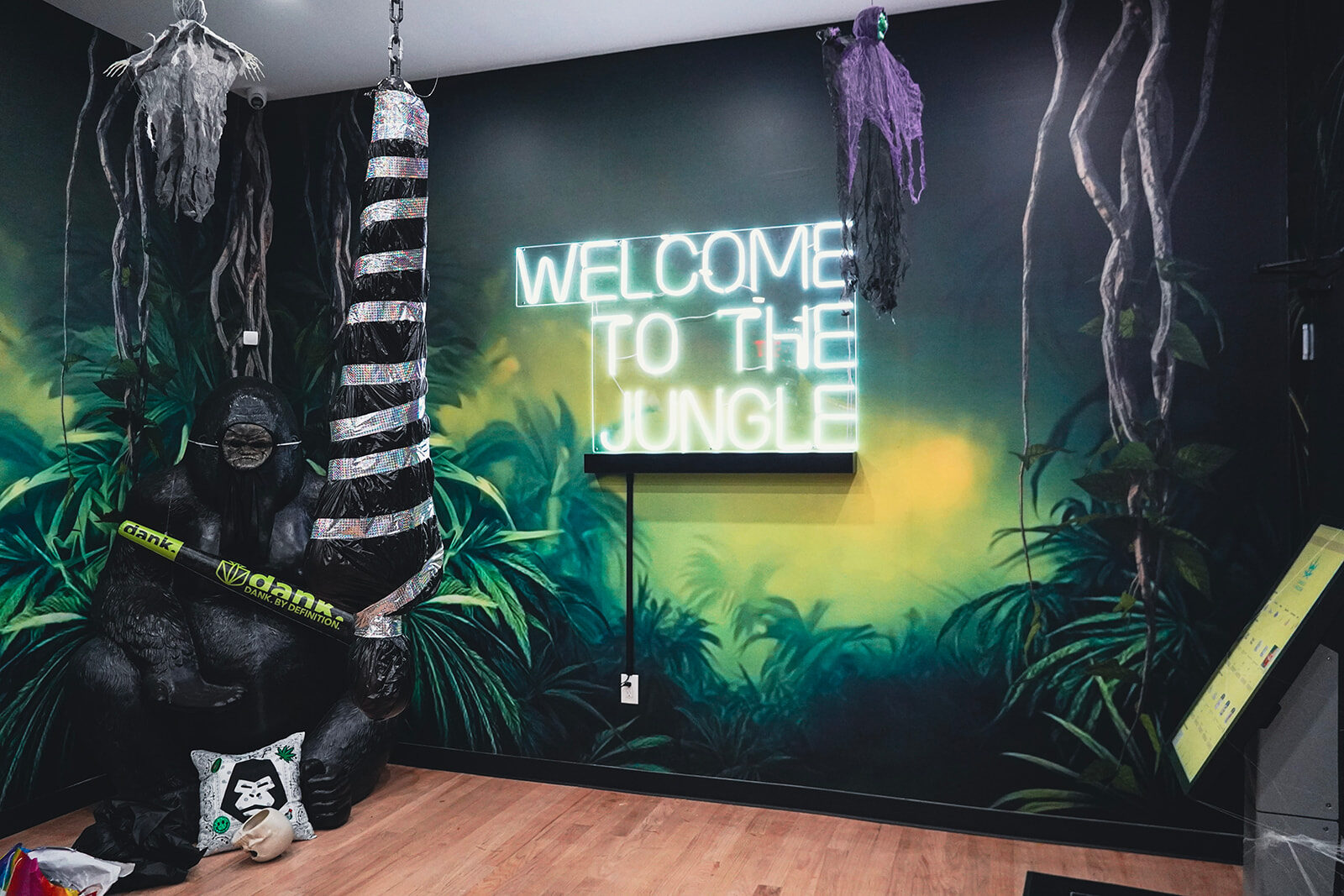 Welcome to the Jungle neon sign inside Jungle Kingdom Flower